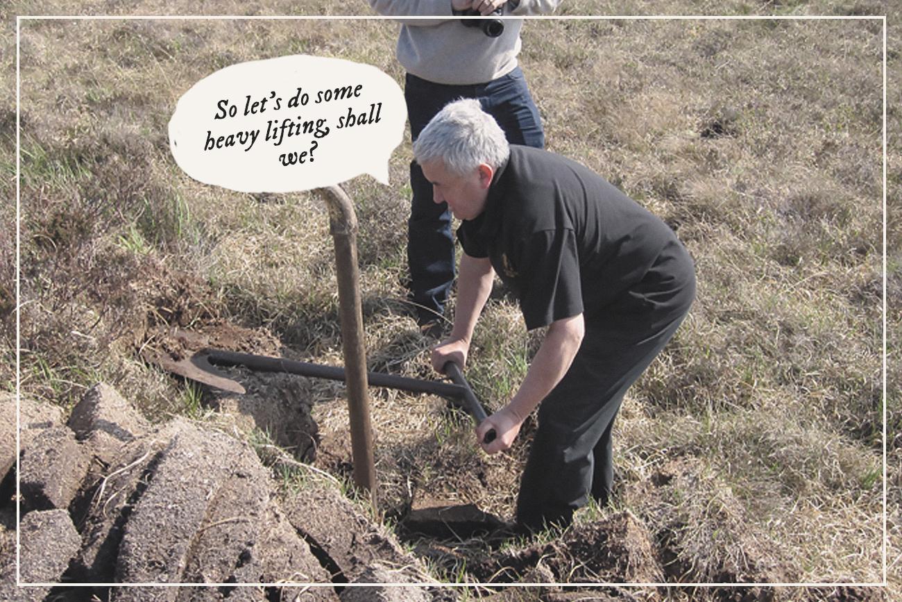 Iain McArthur demonstrates peat cutting Iain McArthur demonstrates peat cutting
