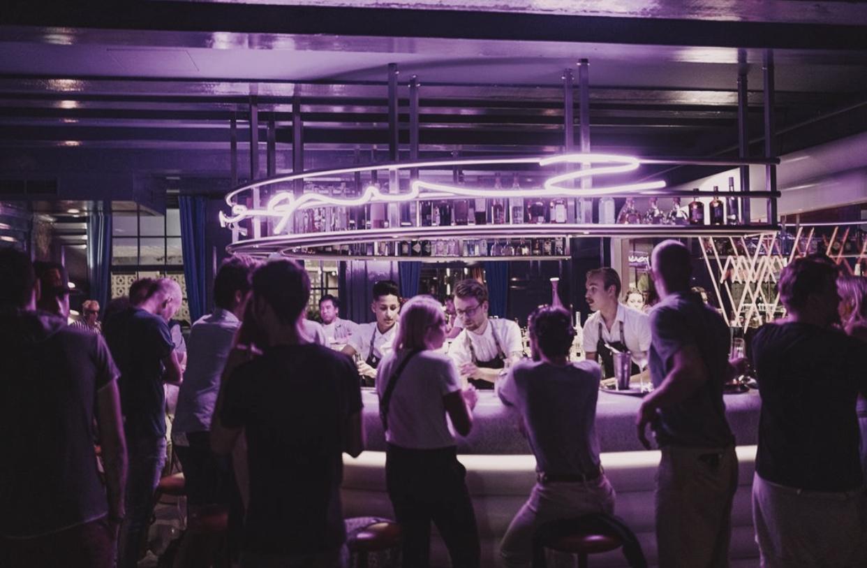 Zana Mohlmann and her coworkers bartending at Super Lyan