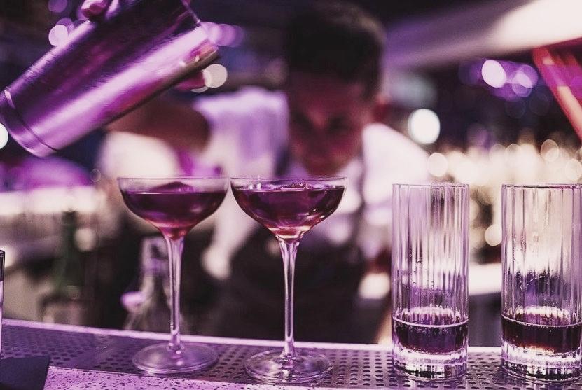 Zana Mohlmann making cocktails