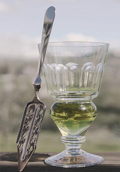 The naturally colored Absinthe is of a yellow-green or brown-green color. The naturally colored Absinthe is of a yellow-green or brown-green color.