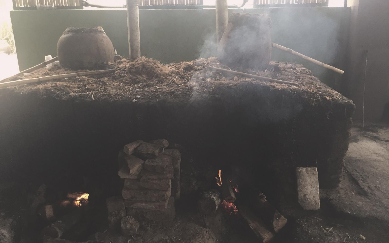 Clay pot distilling at Real Minero in Santa Catarina Minas in the state of Oaxaca by max garrone